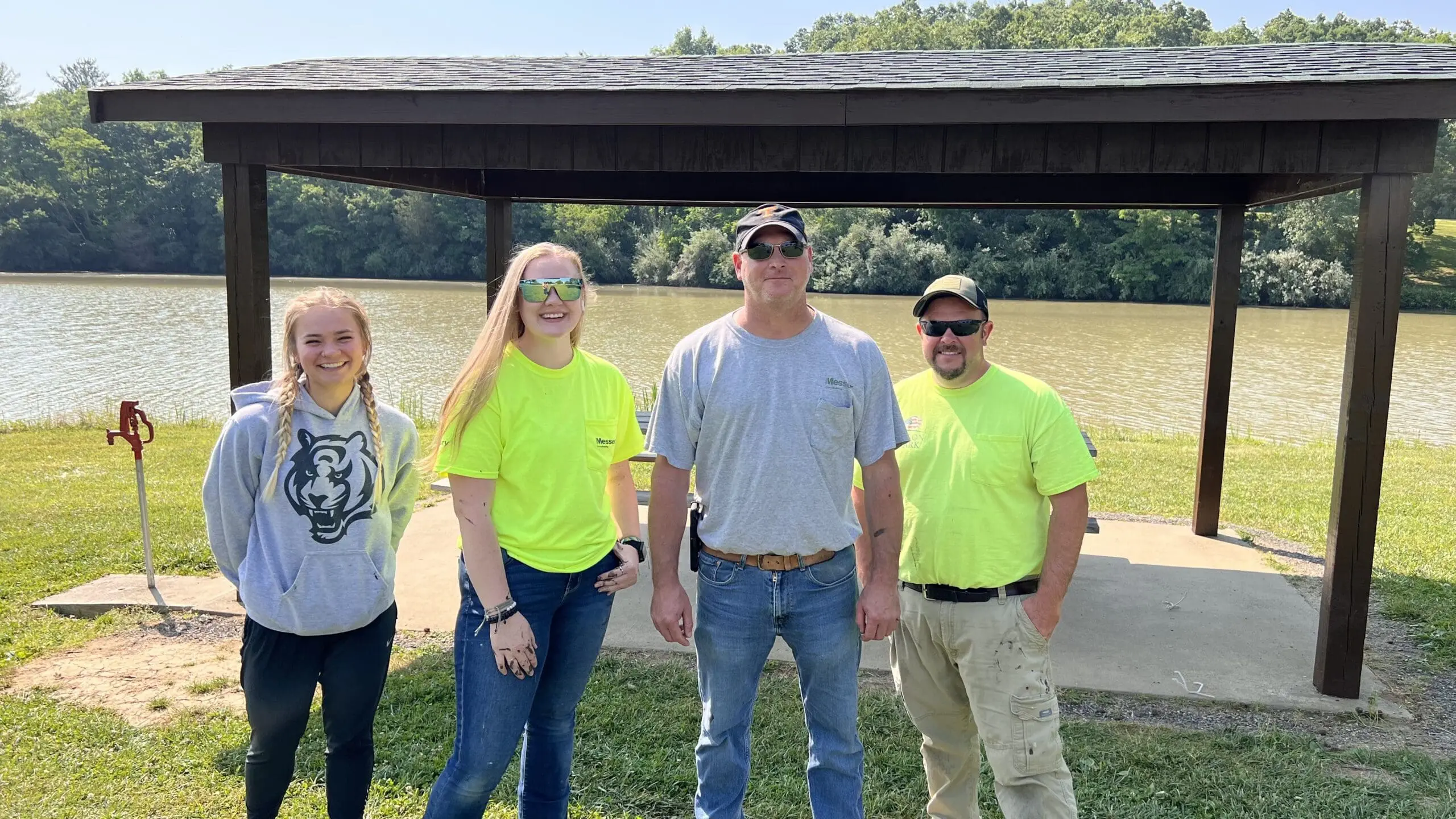 Messer Construction Company employees painting shelters at AJ Jolly Park