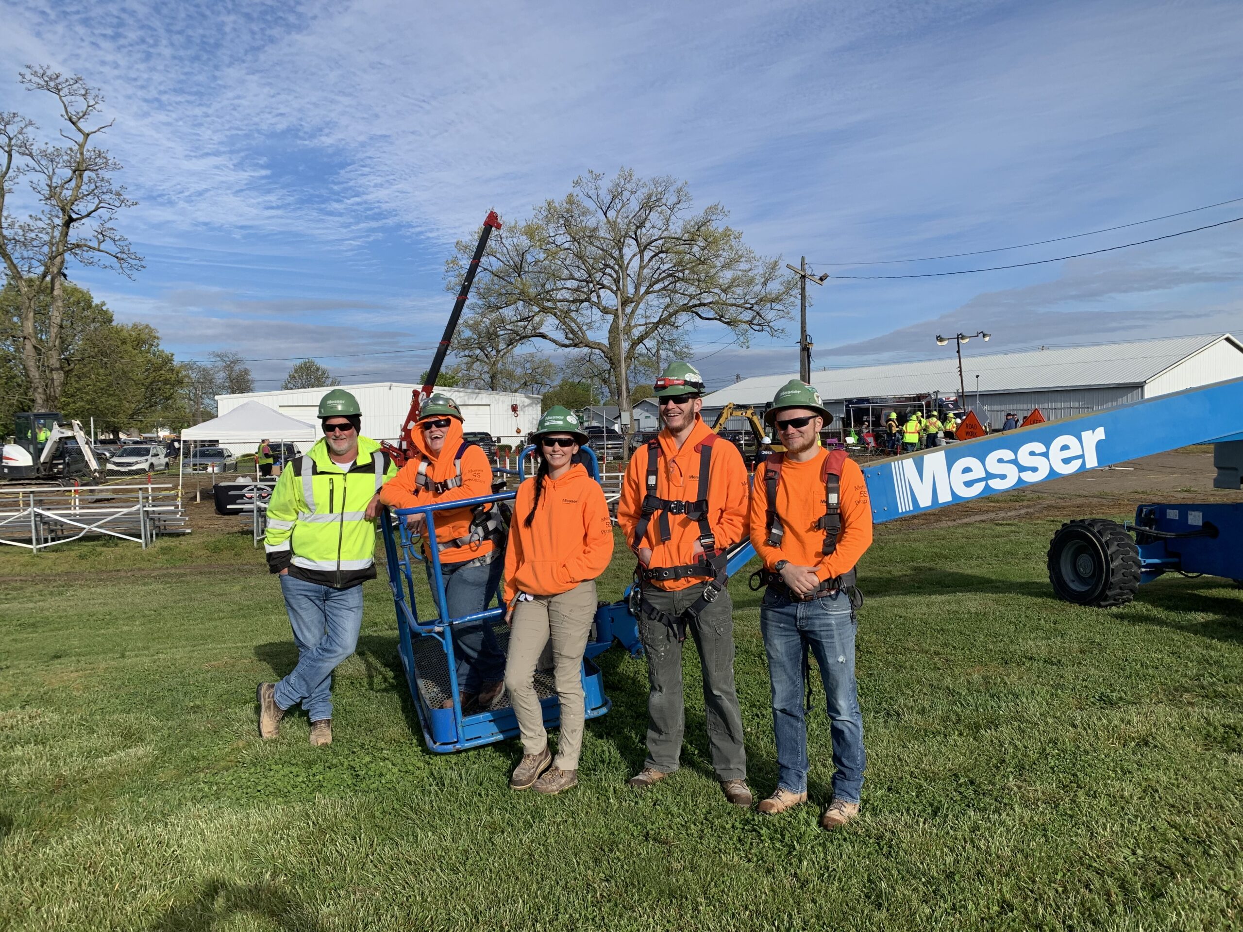 Messer Construction Company employees in PPE at event