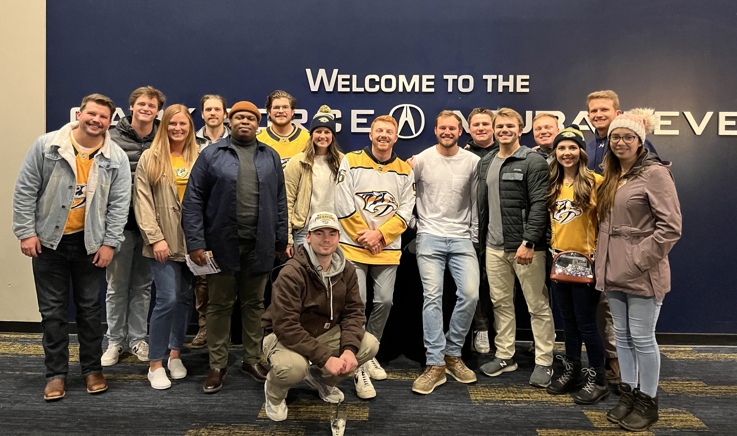 Messer Construction Company employees at a Predators game